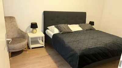 Ein Bett oder Betten in einem Zimmer der Unterkunft Gesamte Unterkunft Apartment in Wien, Österreich