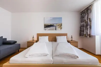 Ein Bett oder Betten in einem Zimmer der Unterkunft Urbanihof in Jois