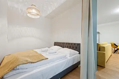 Ein Bett oder Betten in einem Zimmer der Unterkunft KH Mariahilf