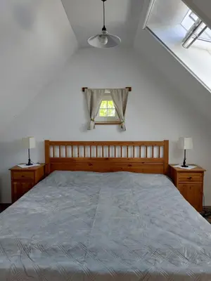 Ein Bett oder Betten in einem Zimmer der Unterkunft Ferienhaus Radlwiesn