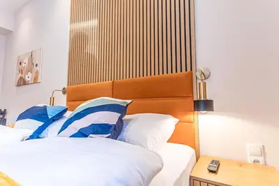 Ein Bett oder Betten in einem Zimmer der Unterkunft Wiener Stadthalle Boutique Rooms - ideal for couples