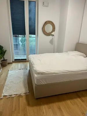 Ein Bett oder Betten in einem Zimmer der Unterkunft Skyline Suite - schick über Wien