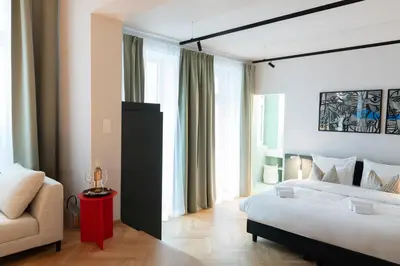 Ein Bett oder Betten in einem Zimmer der Unterkunft URBANAUTS STUDIOS Sylvette