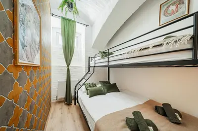 Ein Bett oder Betten in einem Zimmer der Unterkunft GREEN Apartments