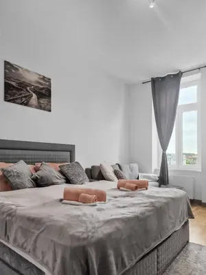 Ein Bett oder Betten in einem Zimmer der Unterkunft Central Vienna Charm