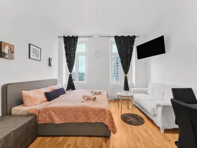 Ein Bett oder Betten in einem Zimmer der Unterkunft Vienna's First District Hideaway