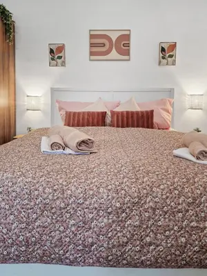Ein Bett oder Betten in einem Zimmer der Unterkunft Augarten Garden Apartments