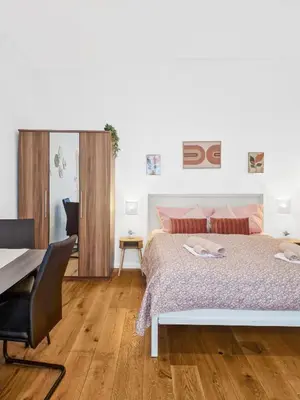 Ein Bett oder Betten in einem Zimmer der Unterkunft Augarten Garden Apartments