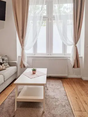 Ein Sitzbereich in der Unterkunft Augarten Garden Apartments