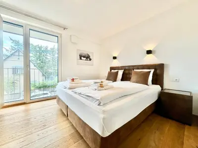 Ein Bett oder Betten in einem Zimmer der Unterkunft Designer Wohnung