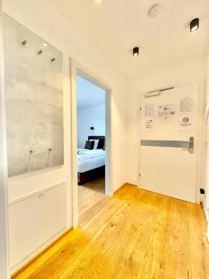 Ein Bett oder Betten in einem Zimmer der Unterkunft Designer Wohnung