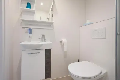 Ein Badezimmer in der Unterkunft DAINN Apartments Schönbrunn