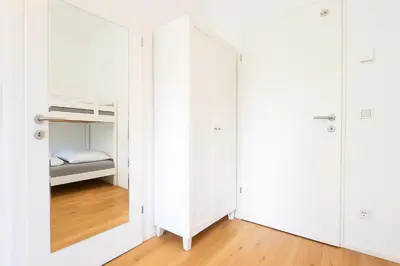 Ein Bett oder Betten in einem Zimmer der Unterkunft DAINN Apartments Schönbrunn