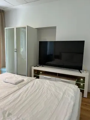 TV/Unterhaltungsangebot in der Unterkunft Apartment mit Gartenblick und Terrasse