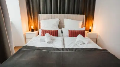 Ein Bett oder Betten in einem Zimmer der Unterkunft Erstklassiges Apartment in Schloss Nähe