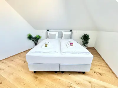 Ein Bett oder Betten in einem Zimmer der Unterkunft Wohnung mit Balkon