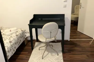 Ein Bett oder Betten in einem Zimmer der Unterkunft Gemütliche Unterkunft mit Balkon in Wien