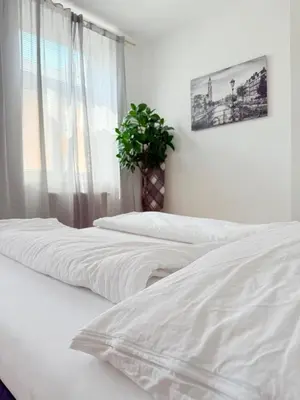 Ein Bett oder Betten in einem Zimmer der Unterkunft Terrassentraum für 2