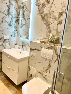 Ein Badezimmer in der Unterkunft TheWICKI 1217 - Wunderschöne Apartments in Wien