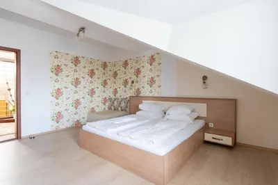 Ein Bett oder Betten in einem Zimmer der Unterkunft FarawayHomes Aparthotel Near Vienna Airport - Anytime Self Check-In