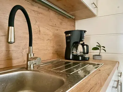 Küche/Küchenzeile in der Unterkunft 110m2 Stylish 4 Bedroom Apartment