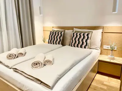 Ein Bett oder Betten in einem Zimmer der Unterkunft TheWICKI 10 - Wunderschöne Apartments in Wien