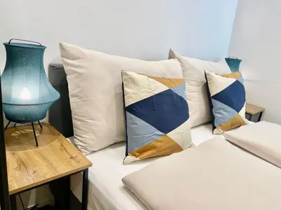 Ein Bett oder Betten in einem Zimmer der Unterkunft TheWICKI 10 - Wunderschöne Apartments in Wien