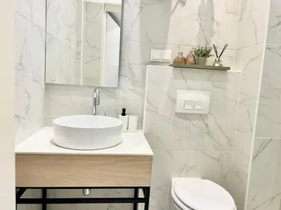 Ein Badezimmer in der Unterkunft TheWICKI 10 - Wunderschöne Apartments in Wien