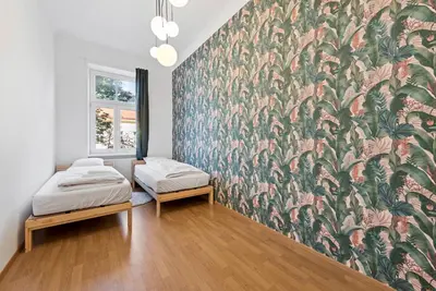 Ein Bett oder Betten in einem Zimmer der Unterkunft Schönbrunn City Apartment is calling - by 4ty3 Apartments