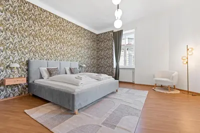 Ein Bett oder Betten in einem Zimmer der Unterkunft Schönbrunn City Apartment is calling - by 4ty3 Apartments