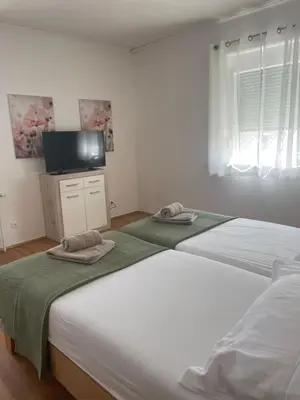 Ein Bett oder Betten in einem Zimmer der Unterkunft Ferienwohnung Apartment Castello