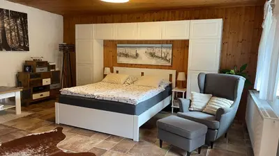 Ein Bett oder Betten in einem Zimmer der Unterkunft Charmantes Cottage Appartement