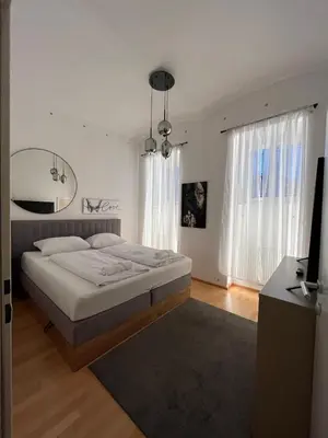 Ein Bett oder Betten in einem Zimmer der Unterkunft Luxury CityApartment 5