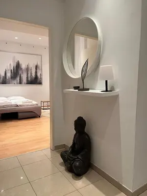 Ein Bett oder Betten in einem Zimmer der Unterkunft Luxury CityApartment 5