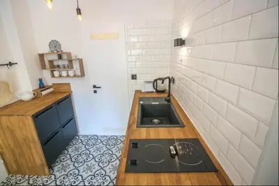 Küche/Küchenzeile in der Unterkunft Süßes Apartment nähe Volkstheater