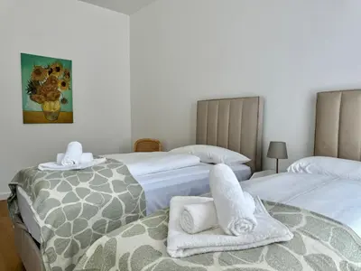 Ein Bett oder Betten in einem Zimmer der Unterkunft City Apartment nahe Schönbrunn 10