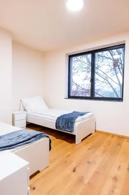 Ein Bett oder Betten in einem Zimmer der Unterkunft Villa Rose close to Vienna & Airport