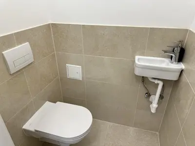 Ein Badezimmer in der Unterkunft City Apartment nahe Schönbrunn 13