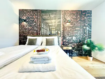 Ein Bett oder Betten in einem Zimmer der Unterkunft Chillige Wohnung mit Balkon
