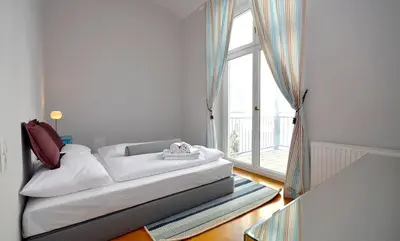 Ein Bett oder Betten in einem Zimmer der Unterkunft Vienna Residence, Pettenkofengasse - Landstraße #6299