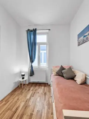 Ein Bett oder Betten in einem Zimmer der Unterkunft tabor strasse apartment