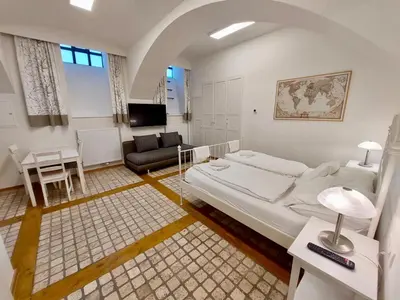 Ein Bett oder Betten in einem Zimmer der Unterkunft Modern Studios near City Center