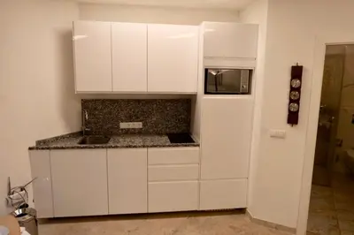 Küche/Küchenzeile in der Unterkunft Modern Studios near City Center