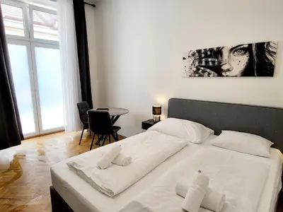 Ein Bett oder Betten in einem Zimmer der Unterkunft Neulerchenfelder City Apartment