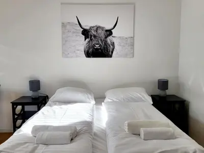 Ein Bett oder Betten in einem Zimmer der Unterkunft Neulerchenfelder City Apartment