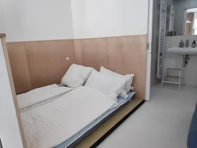 Ein Bett oder Betten in einem Zimmer der Unterkunft Beautiful New Apartment in Donaustadt