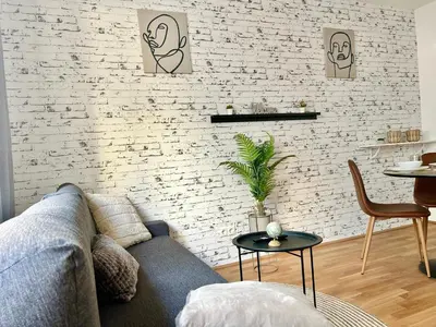 Ein Sitzbereich in der Unterkunft Brand New Central & Modern Apartment