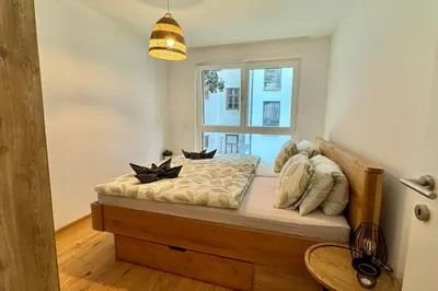 Ein Bett oder Betten in einem Zimmer der Unterkunft Wiener Townhouse Belvedere