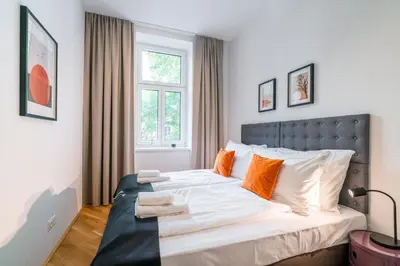Ein Bett oder Betten in einem Zimmer der Unterkunft Vienna Residence, Prater - Exhibition Center