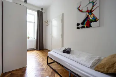 Ein Bett oder Betten in einem Zimmer der Unterkunft Central apartment in Viennese old building